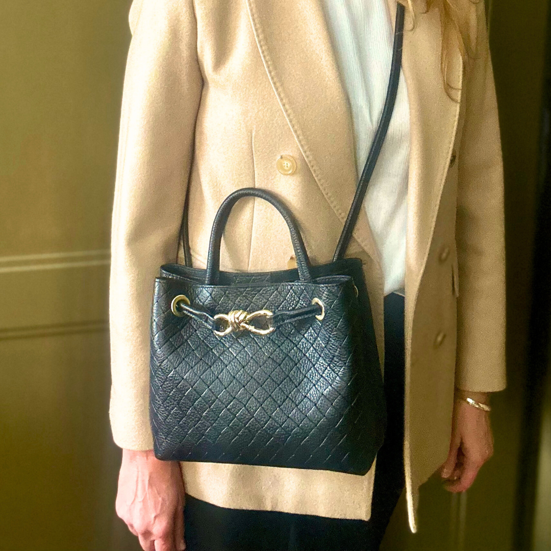 VINCENZA woven leather handbag with gold knot design