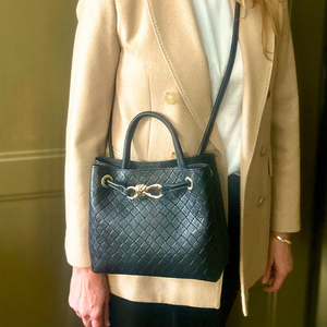 VINCENZA woven leather handbag with gold knot design
