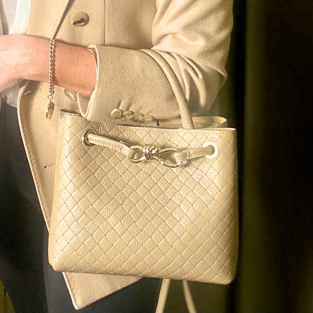 VINCENZA woven leather handbag with gold knot design