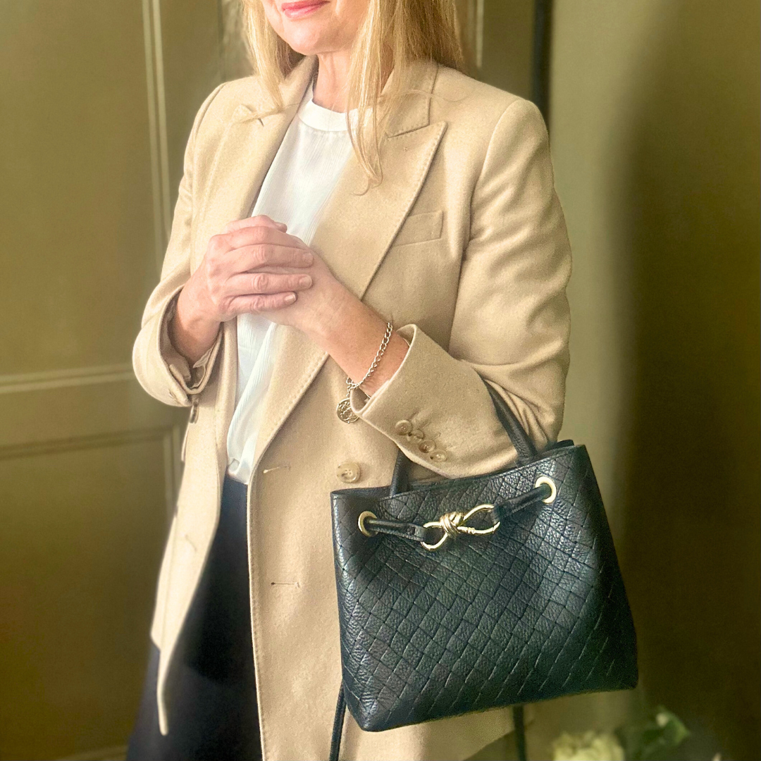 VINCENZA woven leather handbag with gold knot design