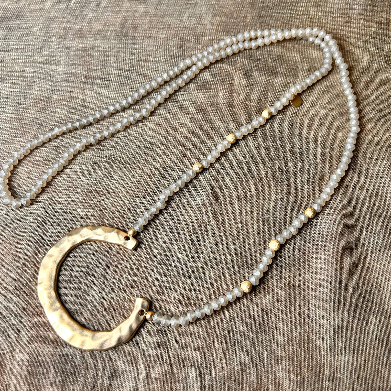 NELLIE long crystal beaded necklace with metal horseshoe pendant