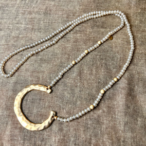 'Nellie' long crystal beaded necklace with metal horseshoe pendant