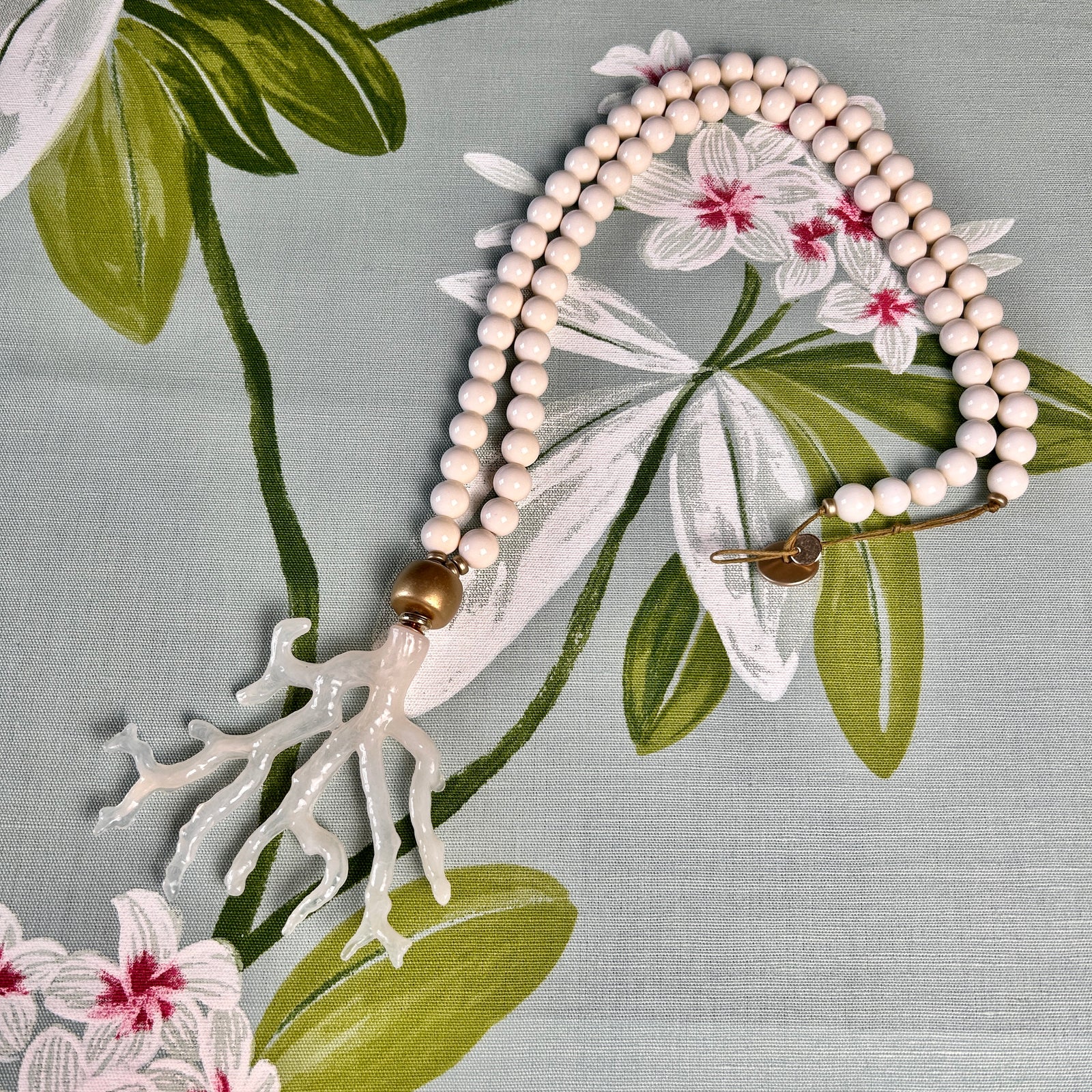 EVA long bead necklace with coral pendant