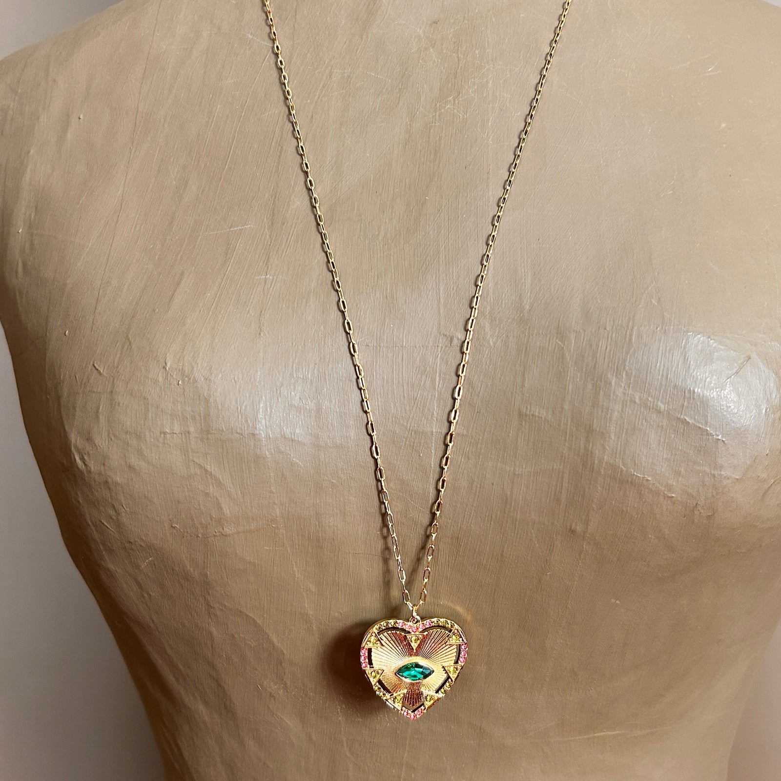 BELLA long chain necklace with emerald crystal heart and eye pendant