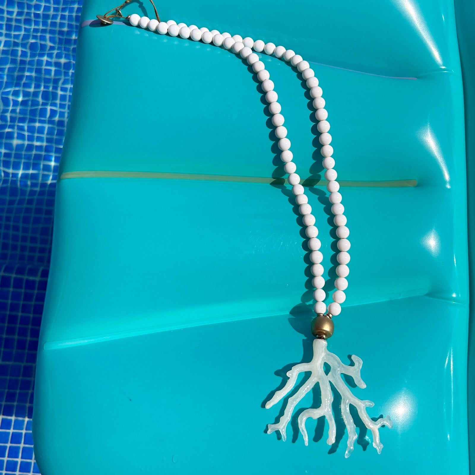 EVA long bead necklace with coral pendant