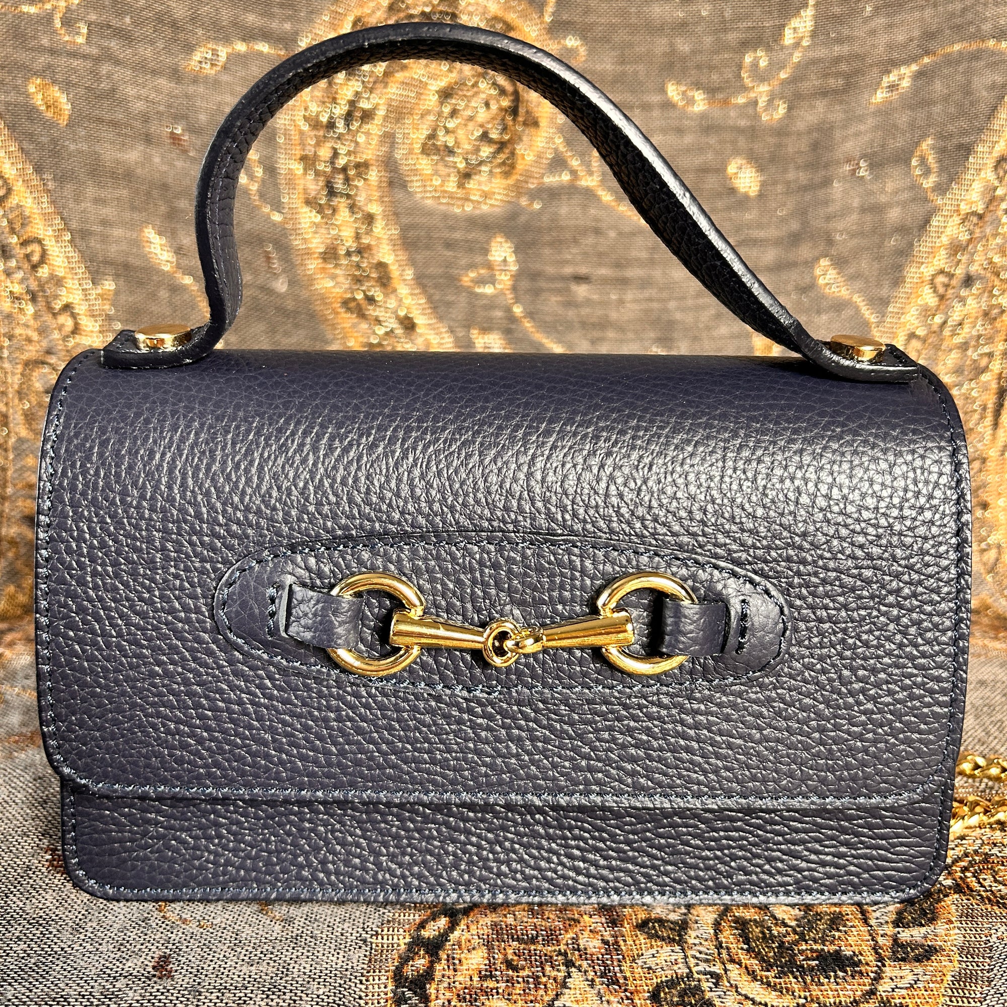 FIRENZE small leather handbag with gold horse bit design