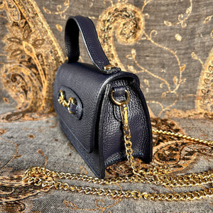 FIRENZE small leather handbag with gold horse bit design