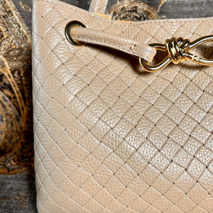 VINCENZA woven leather handbag with gold knot design