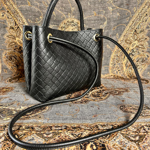 VINCENZA woven leather handbag with gold knot design