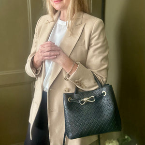 VINCENZA woven leather handbag with gold knot design