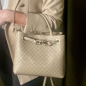 VINCENZA woven leather handbag with gold knot design