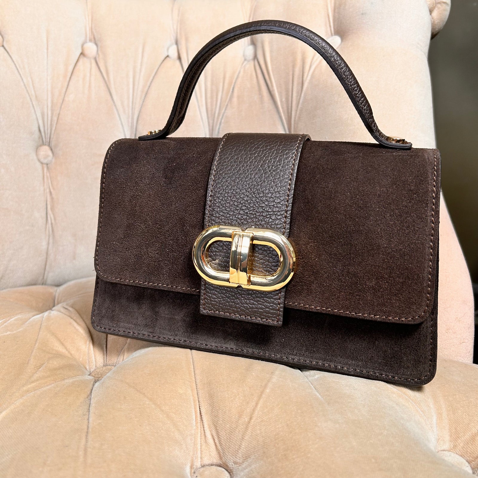 TRIESTE small suede top handle bag with gold hardware design