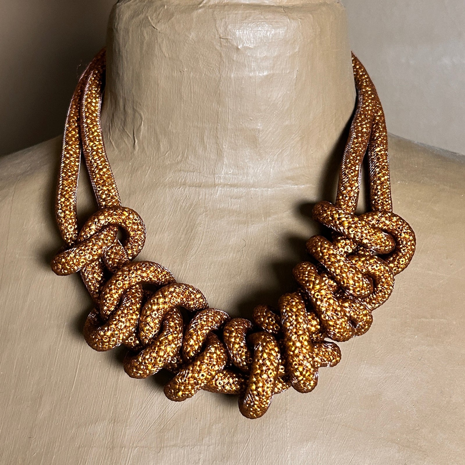 SEBNEM glitter knotted tube necklace