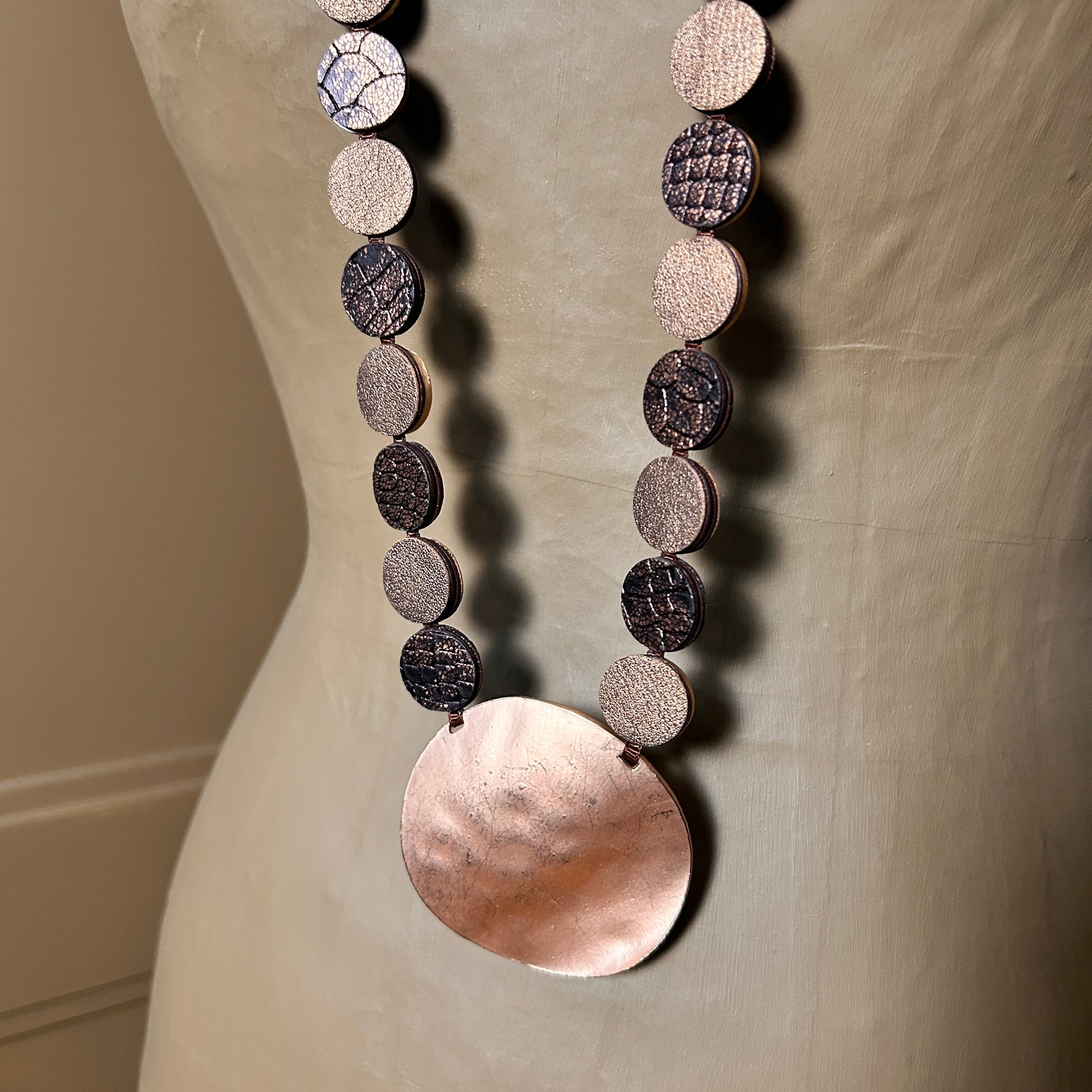 PHILIPPA long metal and suede disc pendant necklace
