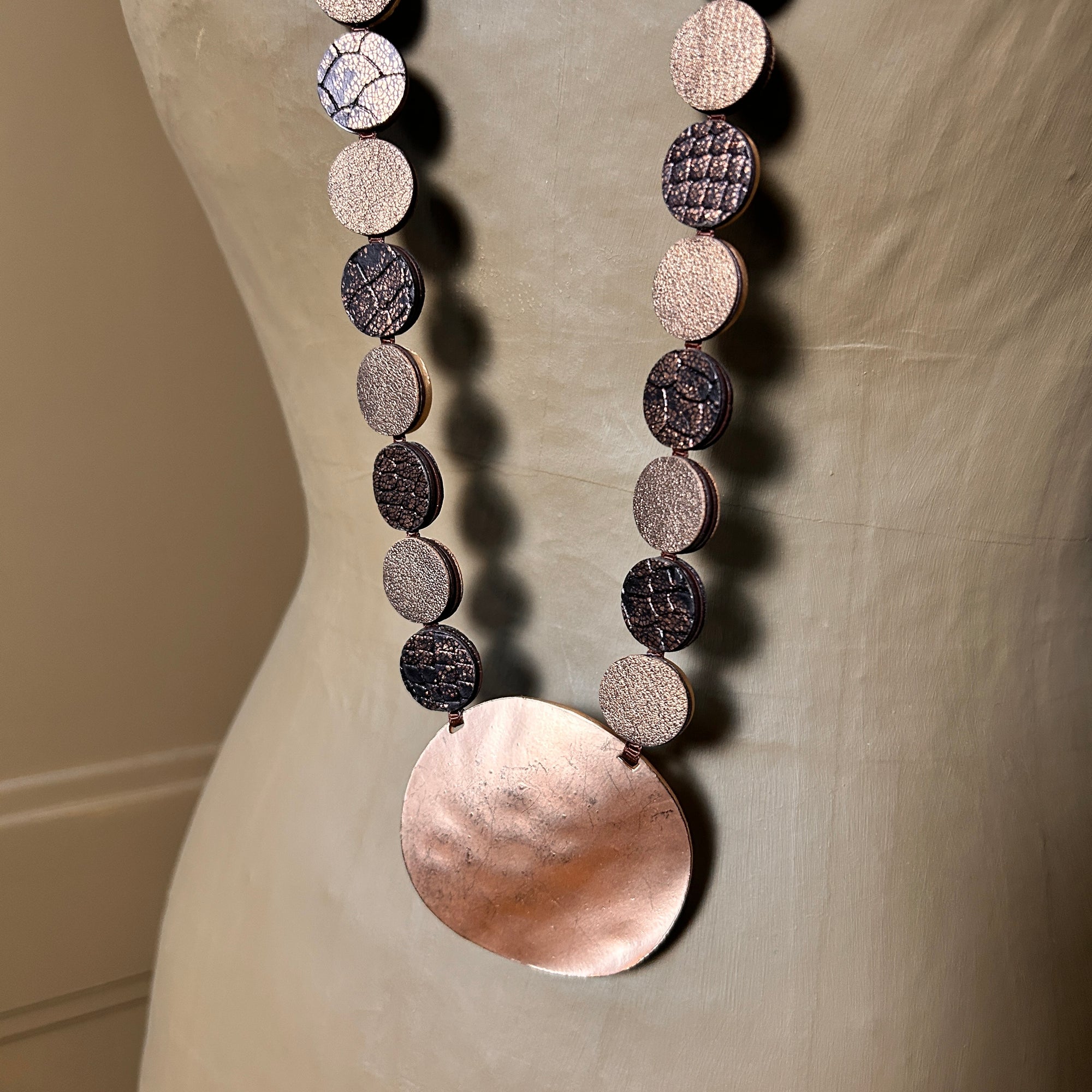 'Philippa' long metal and suede disc pendant necklace