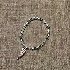 MONICA ball bracelet with angel wing charm