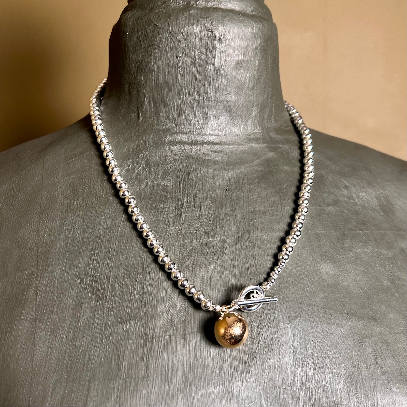 MIA ball necklace with ball pendant