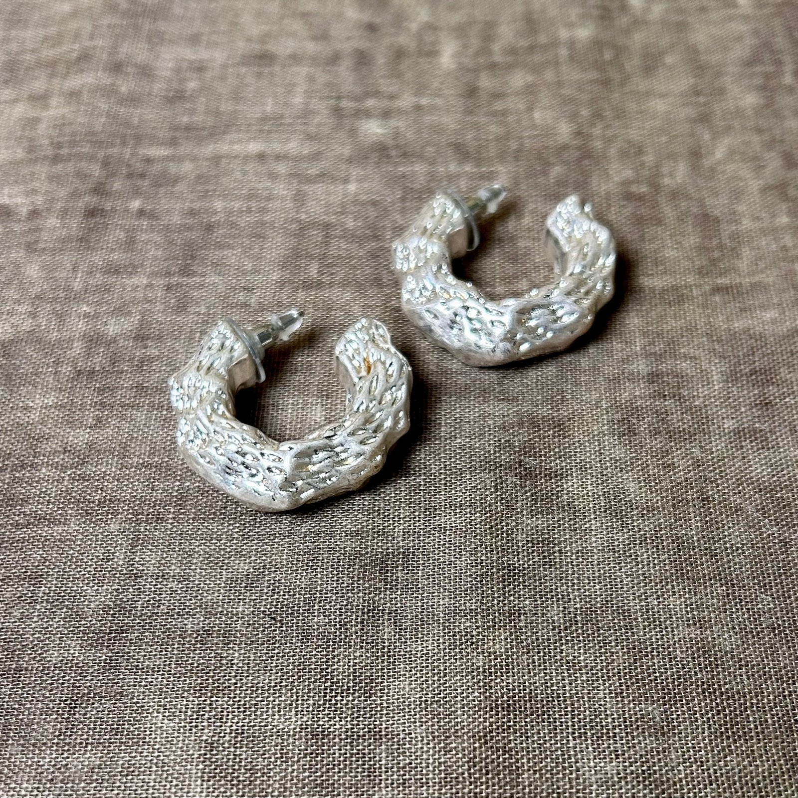 AMIRA beaten metal hoop earrings