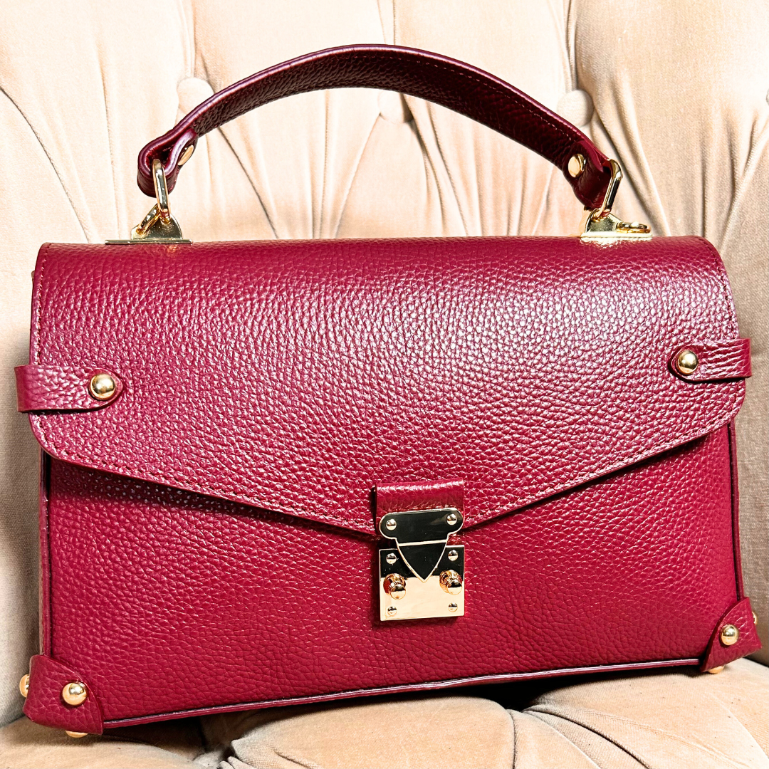 NAPLES leather top handle bag with gold hardware detail