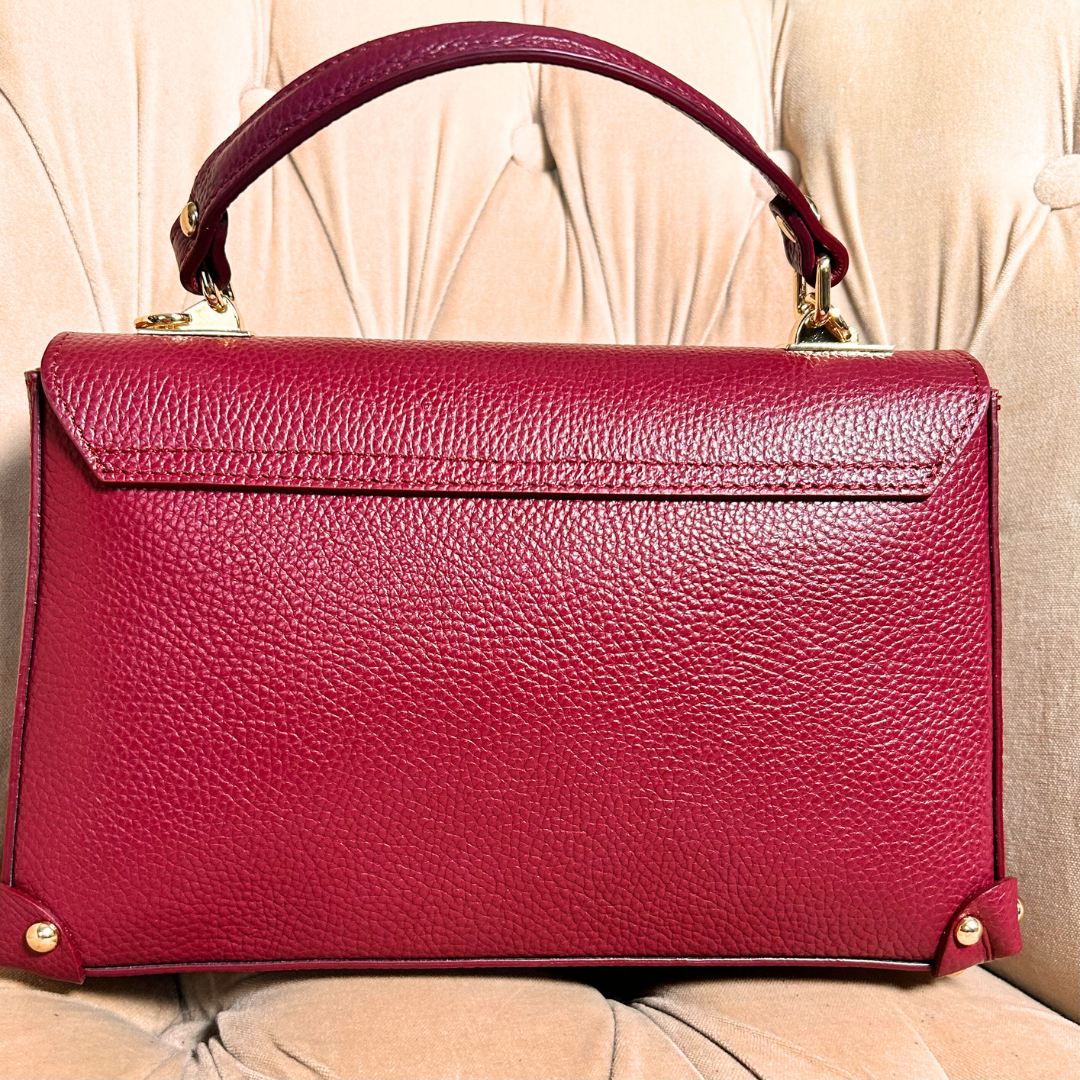 NAPLES leather top handle bag with gold hardware detail