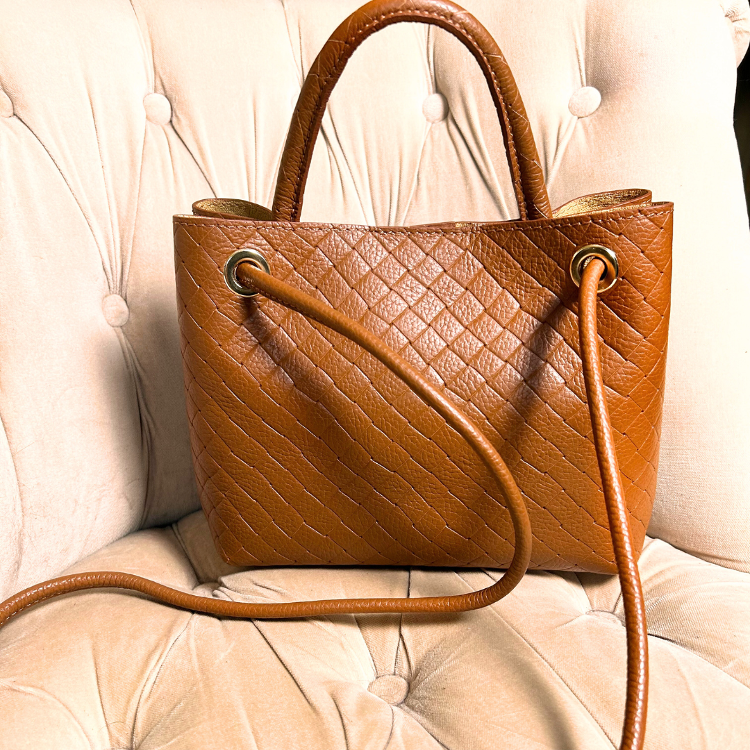 VINCENZA woven leather handbag with gold knot design