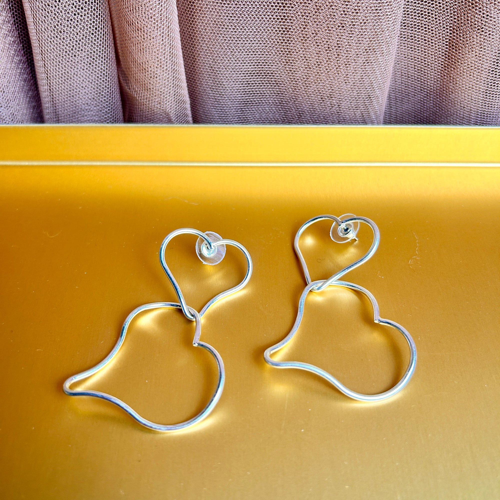 double heart drop statement earrings 