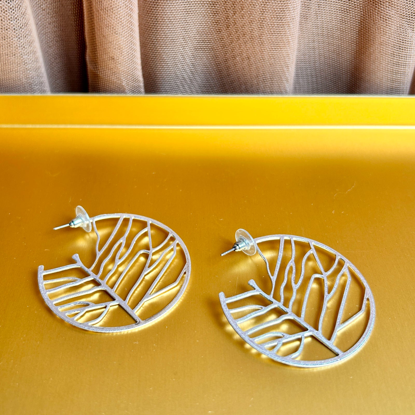 Jenna - metal leaf medium-sized hoop earrings